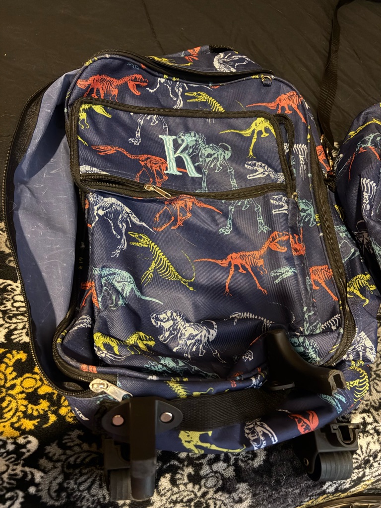 Navy Dinosaur Print Rolling Bag And Other Duffle Bag